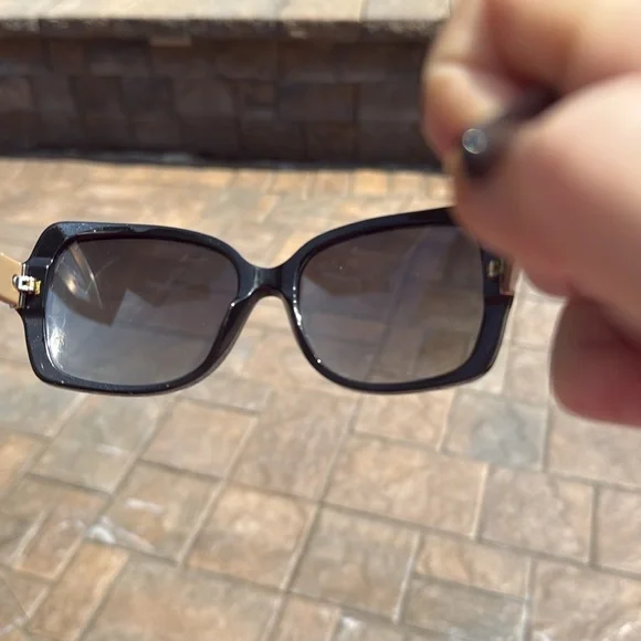 Burberry black lens sunglasses with nova check print on both sides